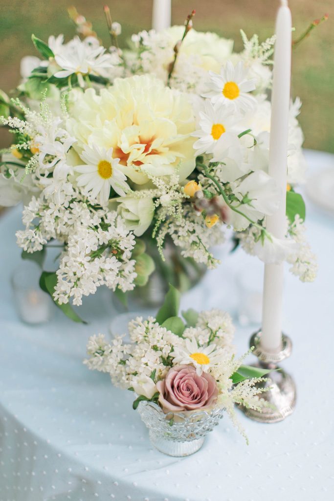 Yellow garden style centerpiece. Yellow tree peony. Daisy. Lilac. Flowers and styling Jessica Ormond Events. Photography Emily Koontz.